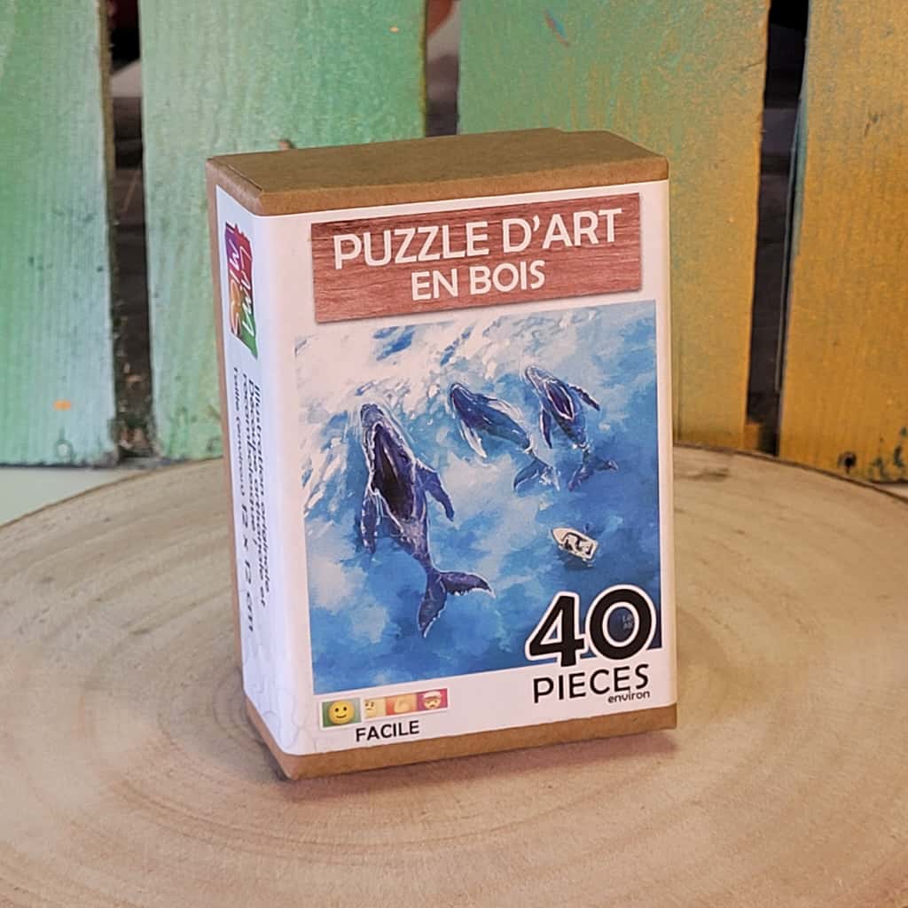 Puzzle engagé en bois, pour le vivant. Découpé à la main, découpe unique. Fabriqué en France près de Nantes. 3 baleines.
